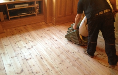 abbots3 Using the sanding machine to sand floorboards
