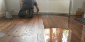 Polishing a wooden floor