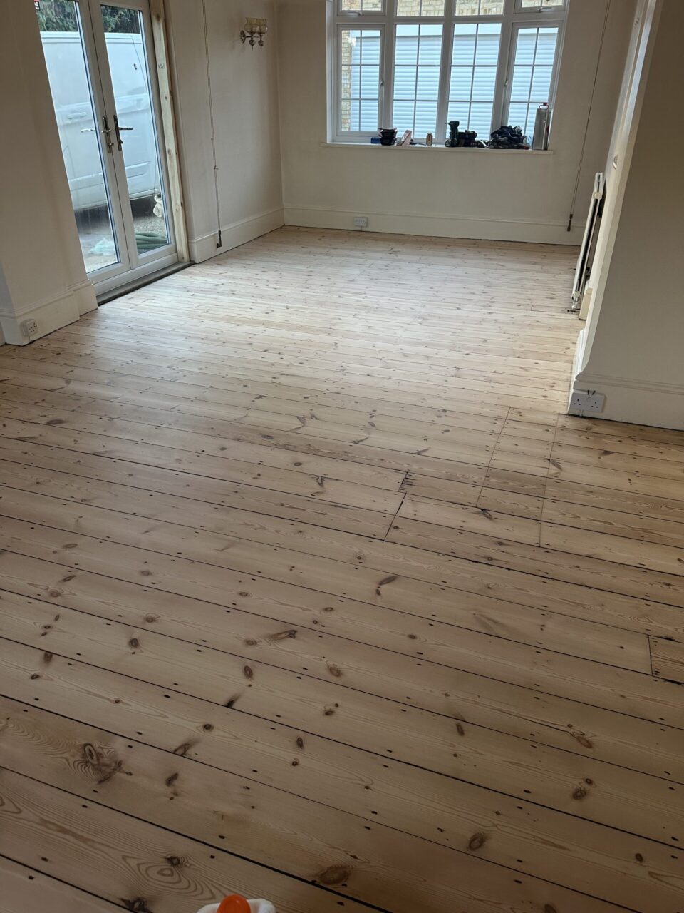Loba Invisible Protect AT on Pine Floorboards