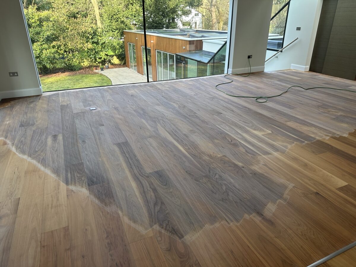 img_4144 The coarse 40 grit sanding removes the UV damage of the Walnut flooring